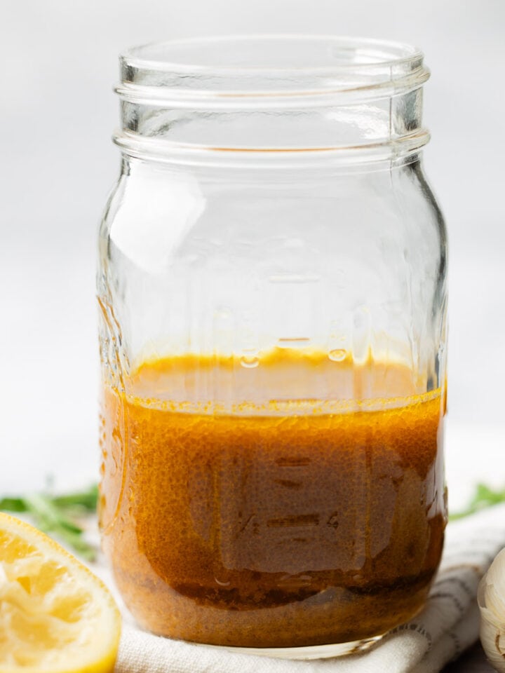 Curry salad dressing in a mason jar.