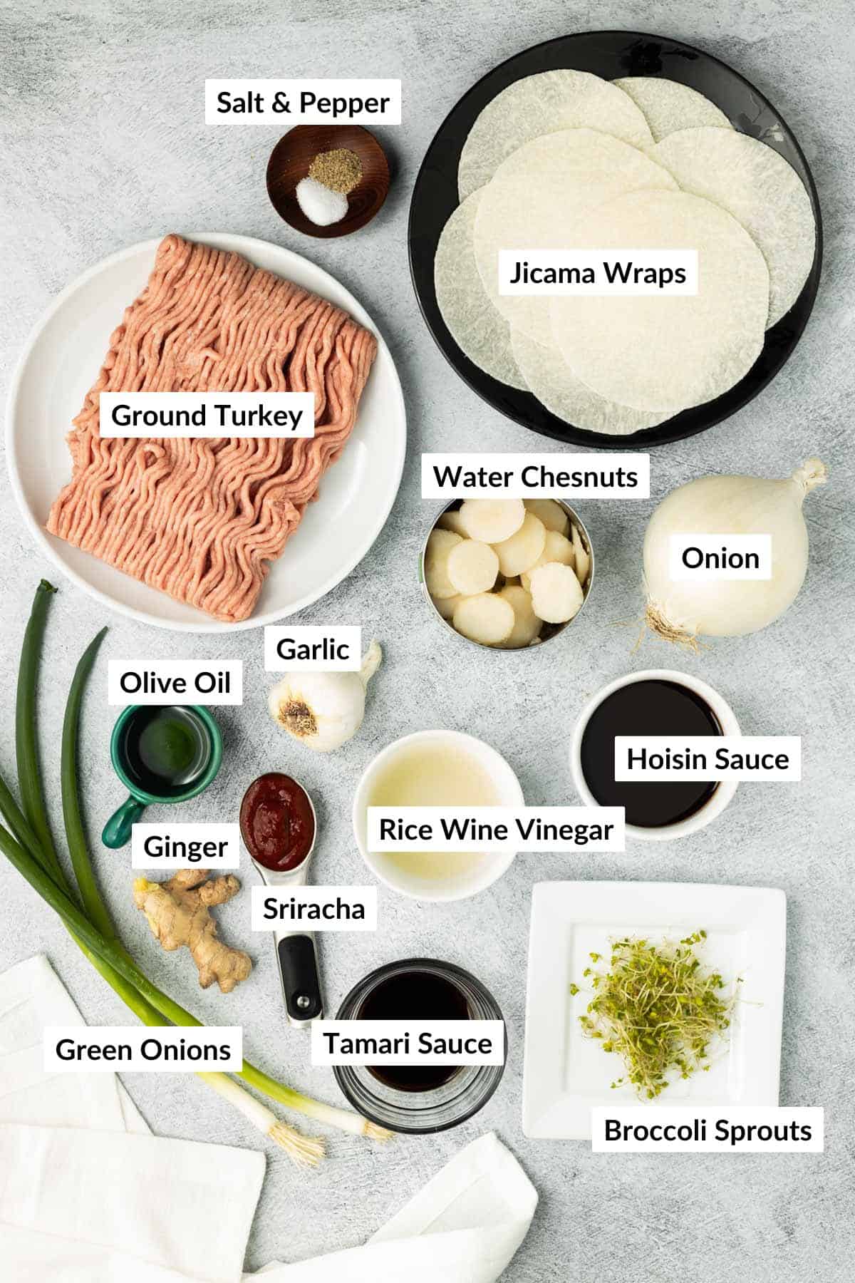 Labeled recipe ingredients are in separate containers on a grey textured background.